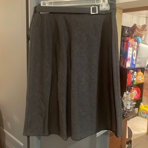 Jones, New York knee length heather gray skirt with belt. Has a little flare.